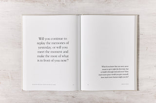 Image of a book with a quote and an open page.