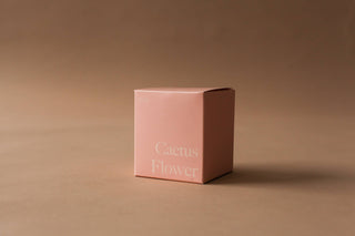 A pink box with 'cactus flower' written on it, representing a delicate and vibrant floral design.