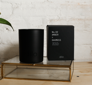 Scented candles and calming incense cones from Adose Wellness to enhance relaxation and create a serene atmosphere.