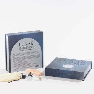 Lunar goddess kit featuring moon-themed crystals, candles, and essential oils for spiritual rituals.