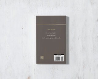 A book with a brown cover and gold trim, showcasing elegance and sophistication.