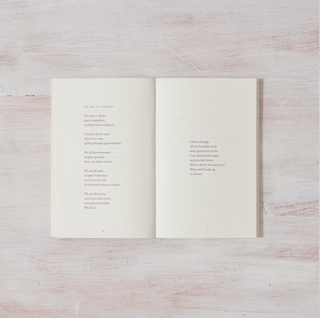 A book with a poem on the front cover and an open page displaying a poem.