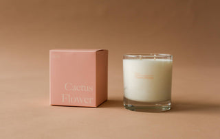 A close-up of a cactus flower candle, showcasing its vibrant colors and intricate details.