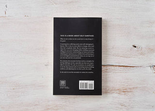 Minimalistic black book cover, sleek and professional.