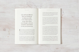 A book open to a poem, showcasing words of beauty and emotion.