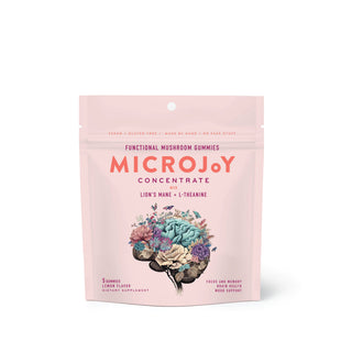 Microjoy concentrate - pink: A small bottle of pink liquid, perfect for adding a burst of flavor to your favorite beverages.