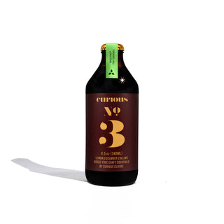 A Curious Elixir No.3 bottle featuring the letter 'B', ideal for a relaxing evening.