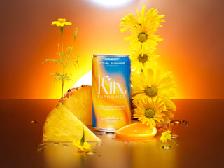 A can of Kim Lemonade featuring a pineapple and sunflowers, creating a refreshing and vibrant image.