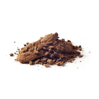 Close-up of a pile of Cacoco organic cacao powder and cacao nibs on a white background.